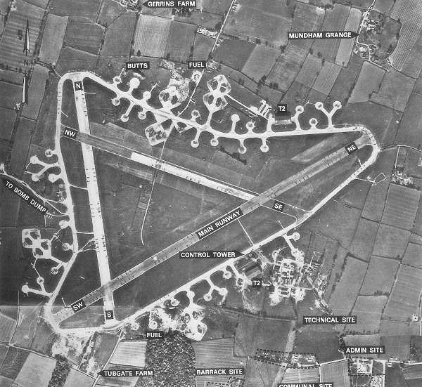 Seething Airfield during WWII showing the complete military installation with runways, hardstands, and buildings